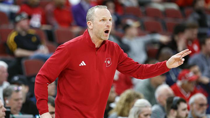 Mar 11, 2026; Chicago, IL, USA; Indiana Hoosiers head coach Darian Devries directs his team against the Northwestern Wildcats during the first half at United Center. Mandatory Credit: Kamil Krzaczynski-Imagn Images