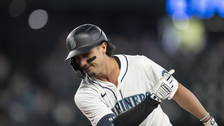 Seattle Mariners third baseman Josh Rojas (4) gestures toward the dugout after hitting a two-run single eighth inning against the Texas Rangers at T-Mobile Park on June 15. Seattle Mariners third baseman Josh Rojas (4) gestures toward the dugout after hitting a two-run single eighth inning against the Texas Rangers at T-Mobile Park on June 15.