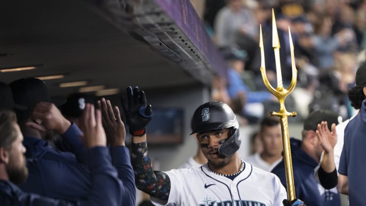 Seattle Mariners centerfielder Julio Rodriguez (44) celebrates in the dugout after hitting a two-run home run third inning against the Texas Rangers at T-Mobile Park on June 15. Seattle Mariners centerfielder Julio Rodriguez (44) celebrates in the dugout after hitting a two-run home run third inning against the Texas Rangers at T-Mobile Park on June 15.