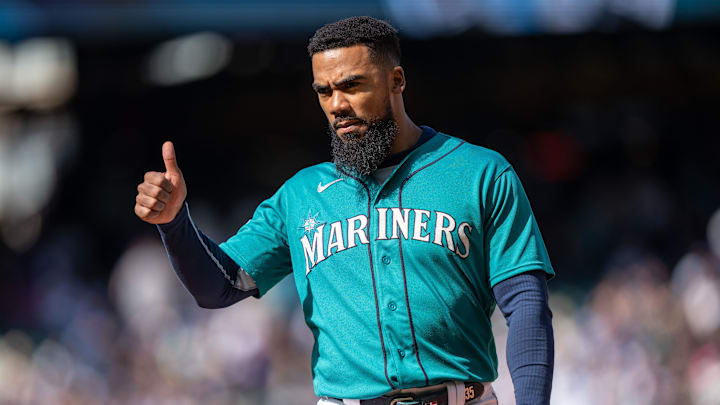 Seattle Mariners right fielder Teoscar Hernandez (35) gestures toward the dugout during a game against the Los Angeles Angels at T-Mobile Park in 2023.