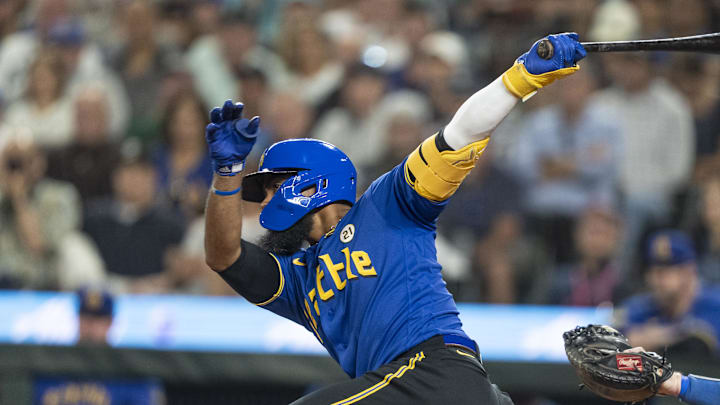 Seattle Mariners right fielder Teoscar Hernandez (35) hits an RBI-single during the sixth inning against the Los Angeles Dodgers at T-Mobile Park in 2023. Seattle Mariners right fielder Teoscar Hernandez (35) hits an RBI-single during the sixth inning against the Los Angeles Dodgers at T-Mobile Park in 2023.