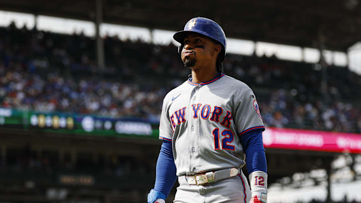 Apr 17, 2026; Chicago, Illinois, USA; New York Mets shortstop Francisco Lindor (12) walks back to the dugout after flying out against the Chicago Cubs during the sixth inning at Wrigley Field. Mandatory Credit: Kamil Krzaczynski-Imagn Images