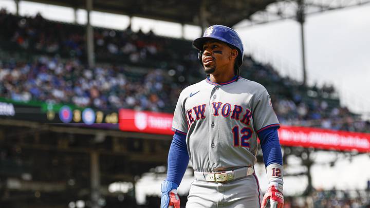Mets shortstop Francisco Lindor (12) walks back to the dugout after batting against the Cubs during the sixth inning.