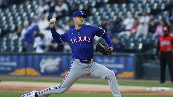 May 23, 2025; Chicago, Illinois, USA; Texas Rangers starting pitcher Tyler Mahle (51) delivers a pitch against the Chicago White Sox during the first inning at Rate Field. 