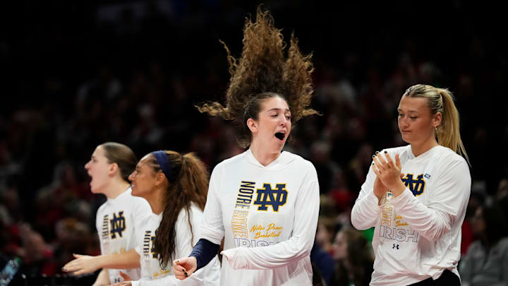 The Notre Dame Fighting Irish bench cheers during the NCAA women's basketball tournament second round game against the Ohio State Buckeyes at the Jerome Schottenstein Center in Columbus on March 23, 2026. Notre Dame won 83-73.