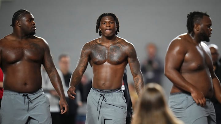 From left, Ohio State Buckeyes defensive tackle Tywone Malone, linebacker Arvell Reese and defensive tackle Kayden McDonald work out during Pro Day for NFL scouts at the Woody Hayes Athletics Center on March 25, 2026. From left, Ohio State Buckeyes defensive tackle Tywone Malone, linebacker Arvell Reese and defensive tackle Kayden McDonald work out during Pro Day for NFL scouts at the Woody Hayes Athletics Center on March 25, 2026.