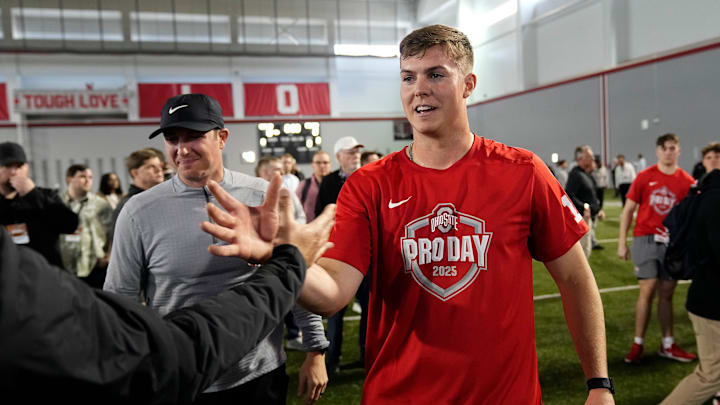 Ohio State Buckeyes quarterback Will Howard gets high fives following his pro day for NFL scouts at the Woody Hayes Athletic Cente on March 26, 2025.