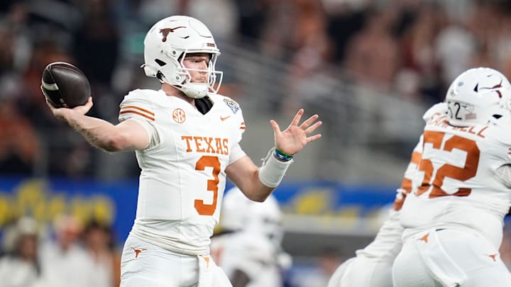 Texas Longhorns quarterback Quinn Ewers (3) throws during the first half of the Cotton Bowl Classic College Football Playoff semifinal game against the Ohio State Buckeyes at AT&T Stadium in Arlington, Texas on Jan. 10, 2025.