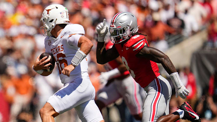 Ohio State Buckeyes linebacker Arvell Reese (8) pursues Texas Longhorns quarterback Arch Manning (16) during the NCAA football game at Ohio Stadium on Aug. 30, 2025.