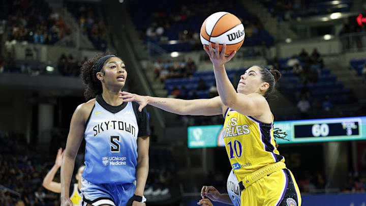 Jun 24, 2025; Chicago, Illinois, USA; Chicago Sky center Kamilla Cardoso (10) goes to the basket against Chicago Sky forward Angel Reese (5) during the second half at Wintrust Arena. Mandatory Credit: Kamil Krzaczynski-Imagn Images