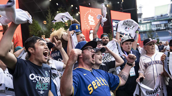 Seattle Mariners fans gather and cheer before the team's pick during the first round of the MLB Draft at Lumen Field in 2023.