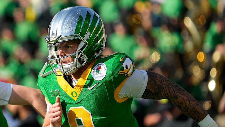 Oregon Ducks quarterback Dillon Gabriel (8) warms up prior to the College Football Playoff quarterfinal against the Ohio State Buckeyes at the Rose Bowl in Pasadena, Calif. on Jan. 1, 2025.