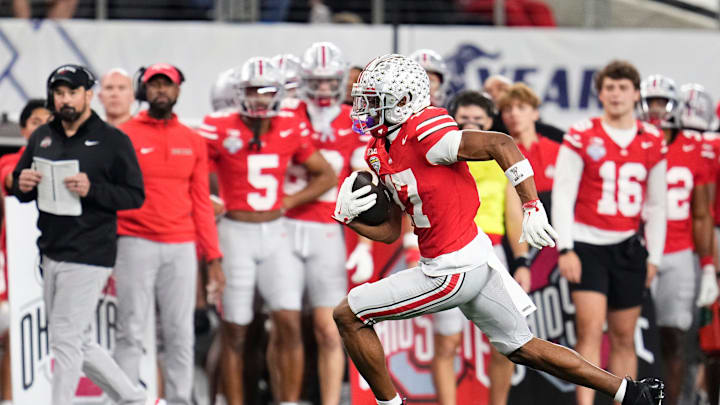 Ohio State Buckeyes wide receiver Carnell Tate (17) runs after a catch during the Cotton Bowl at AT&T Stadium in Arlington, Texas for the College Football Playoff quarterfinal game against the Miami Hurricanes on Dec. 31, 2025. Ohio State lost 24-14. Ohio State Buckeyes wide receiver Carnell Tate (17) runs after a catch during the Cotton Bowl at AT&T Stadium in Arlington, Texas for the College Football Playoff quarterfinal game against the Miami Hurricanes on Dec. 31, 2025. Ohio State lost 24-14.