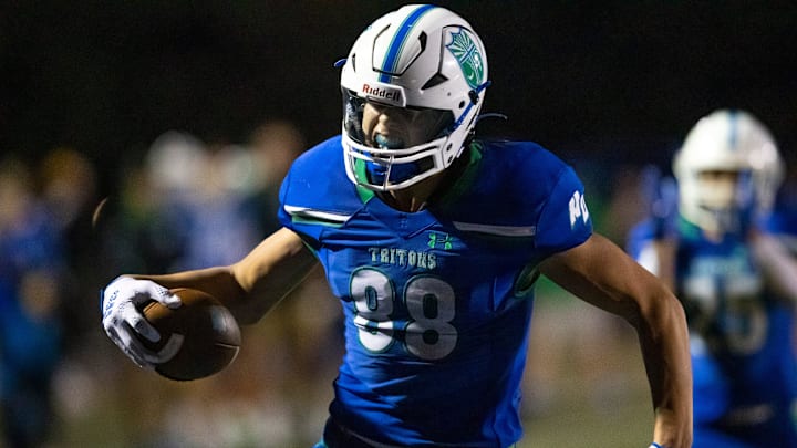 Notre Dame Academy's James Flanigan (88) reacts after scoring a touchdown in the first half of the