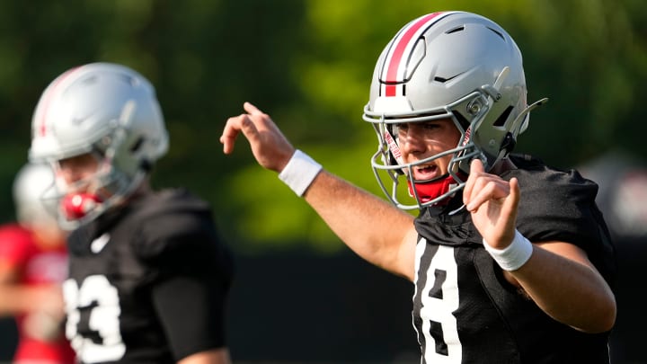 Aug 8, 2024; Columbus, Ohio, USA; Ohio State Buckeyes quarterback Will Howard (18) calls out a play during football practice at the Woody Hayes Athletic Complex. Aug 8, 2024; Columbus, Ohio, USA; Ohio State Buckeyes quarterback Will Howard (18) calls out a play during football practice at the Woody Hayes Athletic Complex.