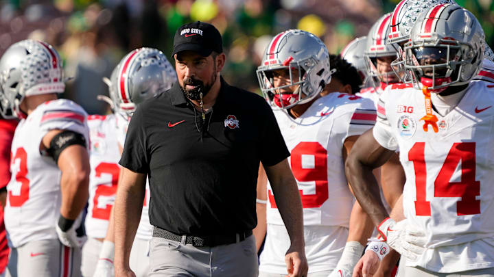 Ohio State Buckeyes head coach Ryan Day leads warm ups for the College Football Playoff quarterfinal against the Oregon Ducks at the Rose Bowl in Pasadena, Calif. on Jan. 1, 2025. Ohio State won 41-21.