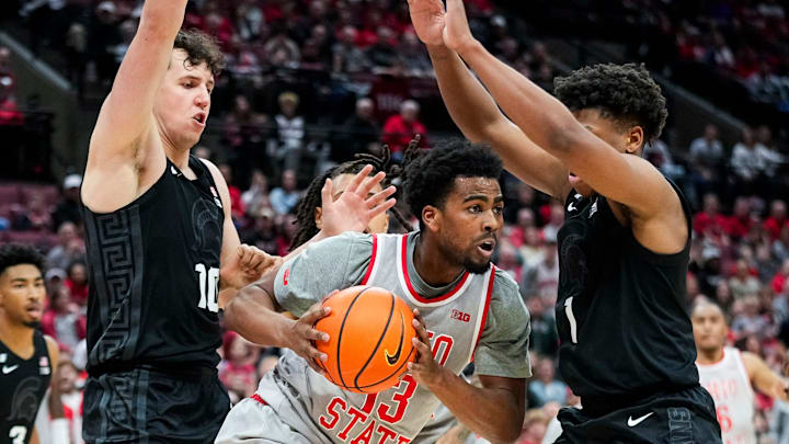 Ohio State Buckeyes forward Sean Stewart (13) looks to pass the ball against the Michigan State Spartans in the second half at Value City Arena on Friday, Jan. 3, 2025 in Columbus, Ohio.