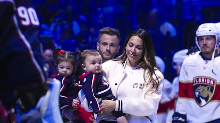 Oct 15, 2024; Columbus, Ohio, USA; Johnny Gaudreau's wife Meredith walks out onto the ice with her children and a family member for a memorial for Johnny and Matthew Gaudreau before the home opener at Nationwide Arena.