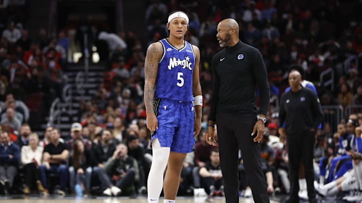 Orlando Magic head coach Jamahl Mosley talks with Orlando Magic forward Paolo Banchero (5) during the second half of a basket ball game against the Chicago Bulls at United Center. Orlando Magic head coach Jamahl Mosley talks with Orlando Magic forward Paolo Banchero (5) during the second half of a basket ball game against the Chicago Bulls at United Center.