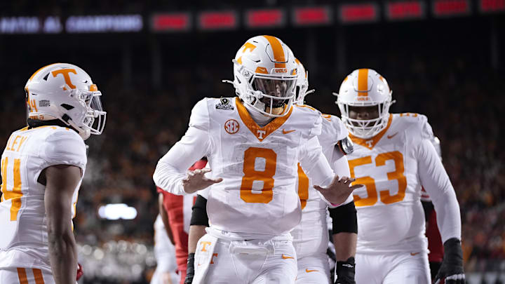 Dec 21, 2024; Columbus, Ohio, USA; Tennessee Volunteers quarterback Nico Iamaleava (8) celebrates after running for a touchdown against the Ohio State Buckeyes during the first half of a College Football Playoff first round game at Ohio Stadium. Mandatory Credit: Adam Cairns-Imagn Images