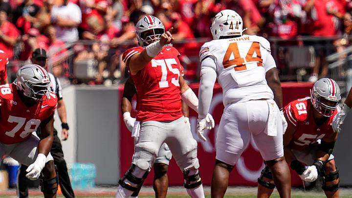 Ohio State Buckeyes offensive lineman Carson Hinzman (75) calls out the Texas Longhorns defense during the NCAA football game at Ohio Stadium on Aug. 30, 2025. Ohio State Buckeyes offensive lineman Carson Hinzman (75) calls out the Texas Longhorns defense during the NCAA football game at Ohio Stadium on Aug. 30, 2025.
