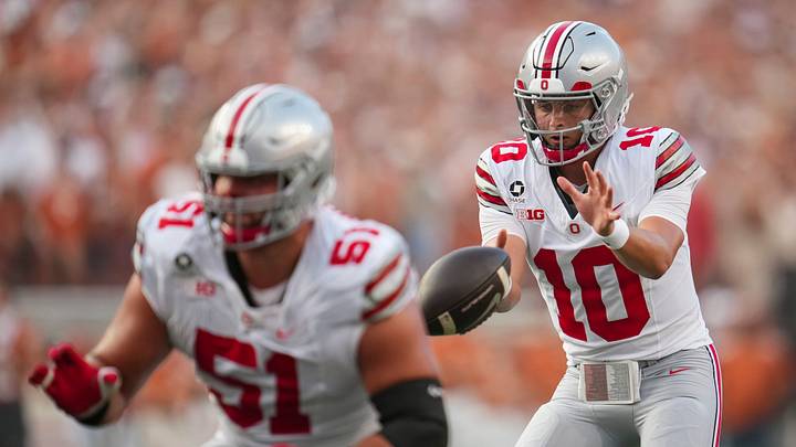 Ohio State Buckeyes quarterback Julian Sayin (10) takes a snap during the NCAA football game against the Texas Longhorns at Darrell K Royal–Texas Memorial Stadium in Austin, Texas on Sept. 12, 2026. Ohio State Buckeyes quarterback Julian Sayin (10) takes a snap during the NCAA football game against the Texas Longhorns at Darrell K Royal–Texas Memorial Stadium in Austin, Texas on Sept. 12, 2026.