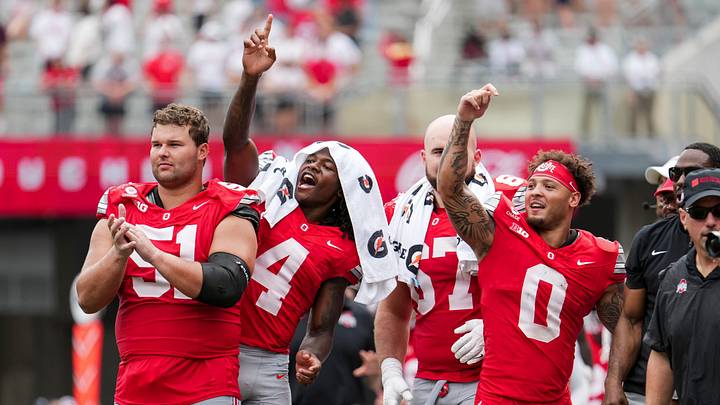 Ohio State Buckeyes offensive lineman Luke Montgomery (51), wide receiver Jeremiah Smith (4) and wide receiver Brandon Inniss (0) celebrate a touchdown by Chris Henry Jr. during the NCAA football game against the Kent State Golden Flashes at Ohio Stadium in Columbus on Sept. 19, 2026. Ohio State won 59-3. Ohio State Buckeyes offensive lineman Luke Montgomery (51), wide receiver Jeremiah Smith (4) and wide receiver Brandon Inniss (0) celebrate a touchdown by Chris Henry Jr. during the NCAA football game against the Kent State Golden Flashes at Ohio Stadium in Columbus on Sept. 19, 2026. Ohio State won 59-3.