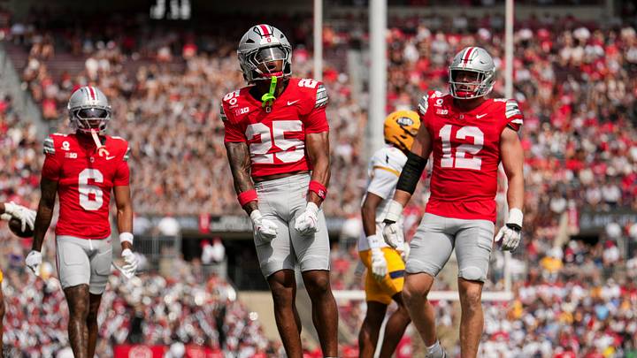 Ohio State Buckeyes cornerback Jay Timmons (25) celebrates with defensive lineman Beau Atkinson (12) during the NCAA football game against the Kent State Golden Flashes at Ohio Stadium in Columbus on Sept. 19, 2026. Ohio State won 59-3. Ohio State Buckeyes cornerback Jay Timmons (25) celebrates with defensive lineman Beau Atkinson (12) during the NCAA football game against the Kent State Golden Flashes at Ohio Stadium in Columbus on Sept. 19, 2026. Ohio State won 59-3.