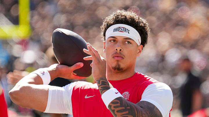 Ohio State Buckeyes quarterback Tavien St. Clair (9) warms up during the NCAA football game against the Iowa Hawkeyes at Kinnick Stadium in Iowa City on Oct. 3, 2026. Ohio State Buckeyes quarterback Tavien St. Clair (9) warms up during the NCAA football game against the Iowa Hawkeyes at Kinnick Stadium in Iowa City on Oct. 3, 2026.