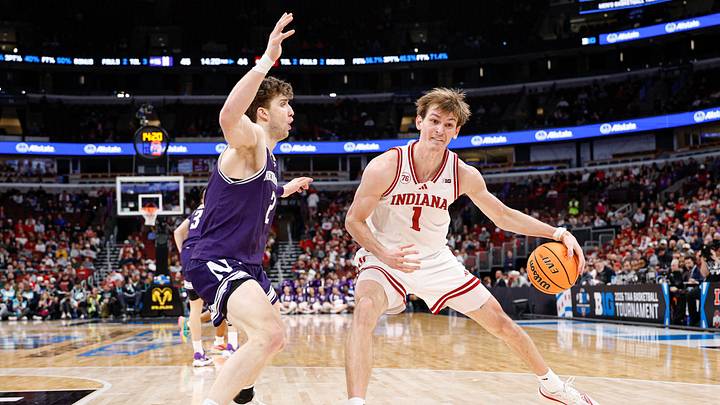 Mar 11, 2026; Chicago, IL, USA; Northwestern Wildcats forward Nick Martinelli (2) defends against Indiana Hoosiers forward Reed Bailey (1) during the second half at United Center. Mar 11, 2026; Chicago, IL, USA; Northwestern Wildcats forward Nick Martinelli (2) defends against Indiana Hoosiers forward Reed Bailey (1) during the second half at United Center.