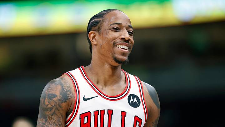 Oct 19, 2023; Chicago, Illinois, USA; Chicago Bulls forward DeMar DeRozan (11) smiles during the first half at United Center. Mandatory Credit: Kamil Krzaczynski-USA TODAY Sports