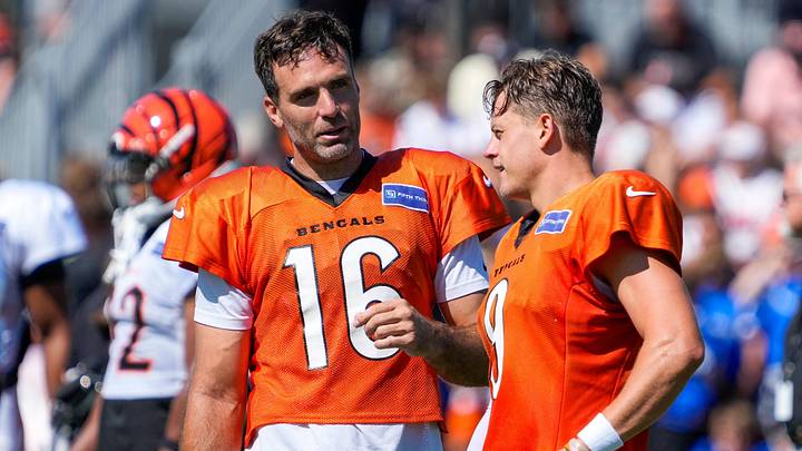 Cincinnati Bengals quarterback Joe Flacco (16) and quarterback Joe Burrow (9) chat during practice at the Paycor Stadium practice facility in downtown Cincinnati on Tuesday, Aug. 4, 2026. Cincinnati Bengals quarterback Joe Flacco (16) and quarterback Joe Burrow (9) chat during practice at the Paycor Stadium practice facility in downtown Cincinnati on Tuesday, Aug. 4, 2026.