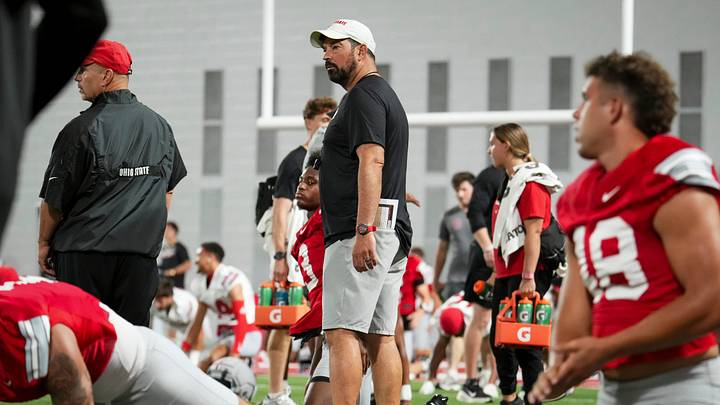 Ohio State Buckeyes head coach Ryan Day watches during football training camp inside the Woody Hayes Athletic Center in Columbus on Aug. 7, 2026. Ohio State Buckeyes head coach Ryan Day watches during football training camp inside the Woody Hayes Athletic Center in Columbus on Aug. 7, 2026.