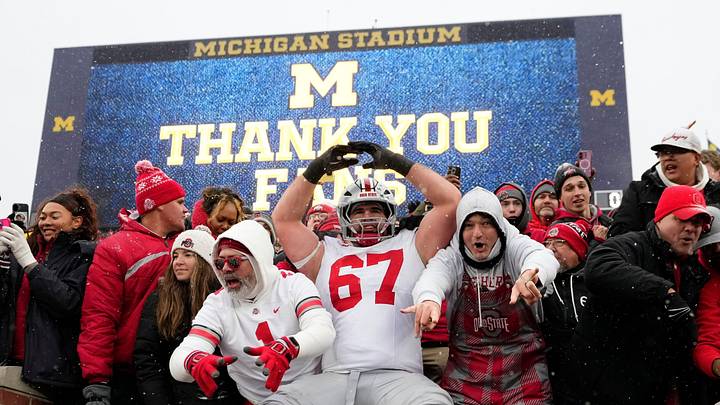 Ohio State tackle Austin Siereveld celebrates with fans after the win over Michigan on Nov. 29. Ohio State tackle Austin Siereveld celebrates with fans after the win over Michigan on Nov. 29.
