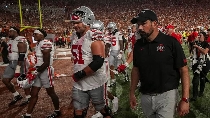 Ohio State Buckeyes head coach Ryan Day watches his players leave the field following the NCAA football game against the Texas Longhorns at Darrell K Royal–Texas Memorial Stadium in Austin, Texas on Sept. 12, 2026.