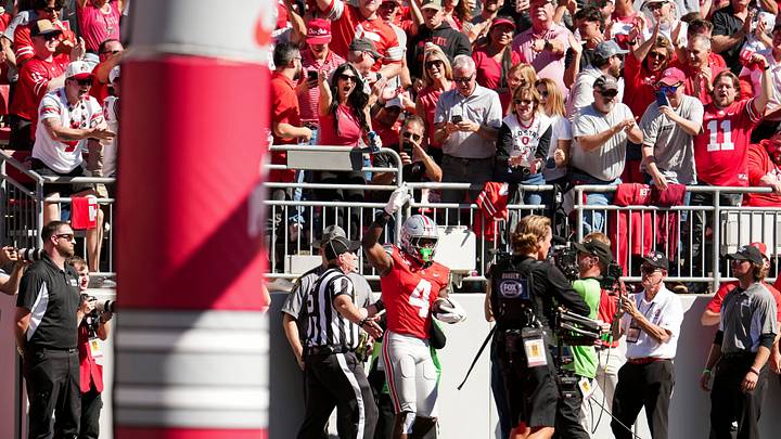 Ohio State Buckeyes wide receiver Jeremiah Smith (4) celebrates a touchdown during the NCAA football game against the Illinois Fighting Illini at Ohio Stadium in Columbus on Sept. 26, 2026. Ohio State Buckeyes wide receiver Jeremiah Smith (4) celebrates a touchdown during the NCAA football game against the Illinois Fighting Illini at Ohio Stadium in Columbus on Sept. 26, 2026.