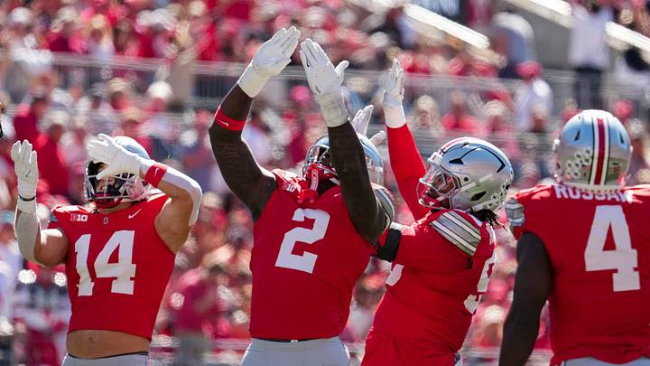 Ohio State Buckeyes defensive end Kenyatta Jackson Jr. (2) celebrates a sack of Illinois Fighting Illini quarterback Katin Houser (4) during the NCAA football game at Ohio Stadium in Columbus on Sept. 26, 2026. Ohio State Buckeyes defensive end Kenyatta Jackson Jr. (2) celebrates a sack of Illinois Fighting Illini quarterback Katin Houser (4) during the NCAA football game at Ohio Stadium in Columbus on Sept. 26, 2026.