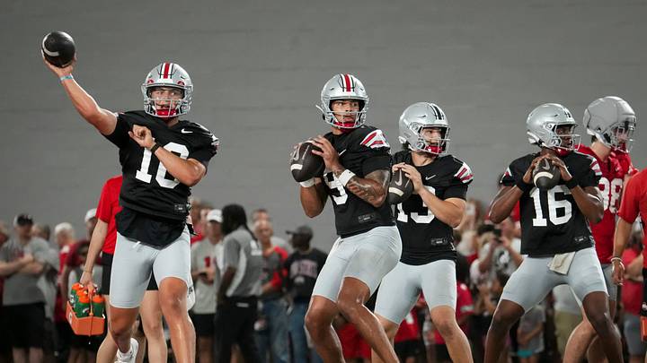 Ohio State Buckeyes quarterbacks, from left, Julian Sayin (10), Tavien St. Clair (9), Luke Fahey (13) and Justyn Martin (16) throw during football training camp inside the Woody Hayes Athletic Center in Columbus on Aug. 7, 2026. Ohio State Buckeyes quarterbacks, from left, Julian Sayin (10), Tavien St. Clair (9), Luke Fahey (13) and Justyn Martin (16) throw during football training camp inside the Woody Hayes Athletic Center in Columbus on Aug. 7, 2026.