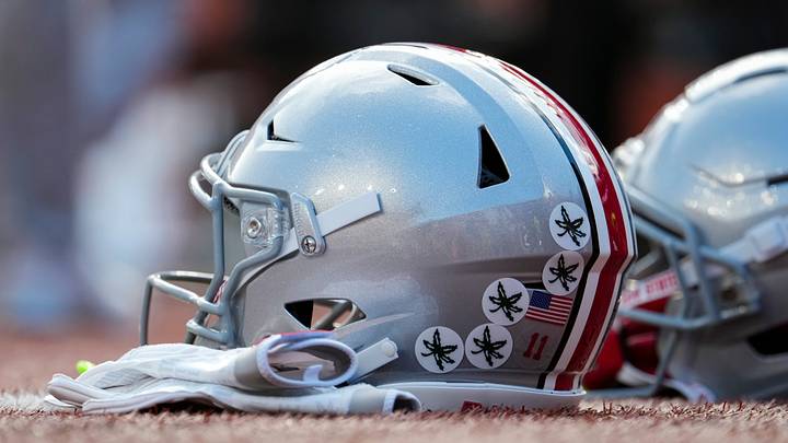 Ohio State Buckeyes football helmets sit on the sideline prior to the NCAA football game against the Texas Longhorns at Darrell K Royal–Texas Memorial Stadium in Austin, Texas on Sept. 12, 2026.
