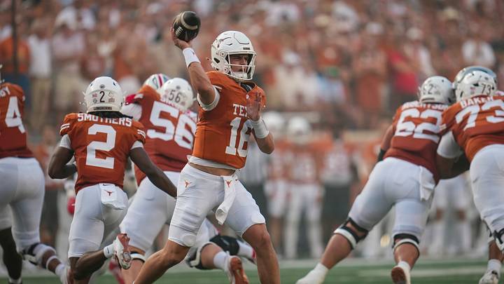 Texas Longhorns quarterback Arch Manning throws during the NCAA football game against the Ohio State Buckeyes