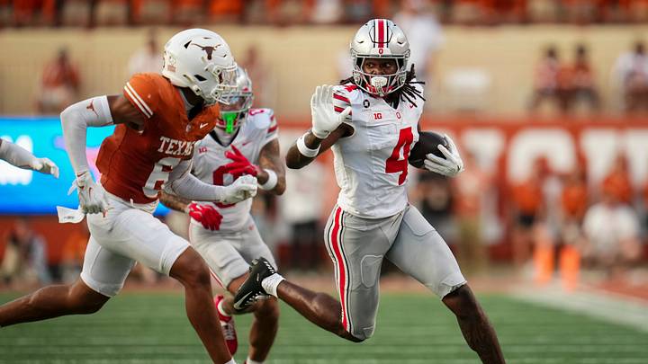 Ohio State Buckeyes wide receiver Jeremiah Smith (4) runs around Texas Longhorns defensive back Kobe Black (6) during the NCAA football game at Darrell K Royal–Texas Memorial Stadium in Austin, Texas on Sept. 12, 2026. Ohio State Buckeyes wide receiver Jeremiah Smith (4) runs around Texas Longhorns defensive back Kobe Black (6) during the NCAA football game at Darrell K Royal–Texas Memorial Stadium in Austin, Texas on Sept. 12, 2026.