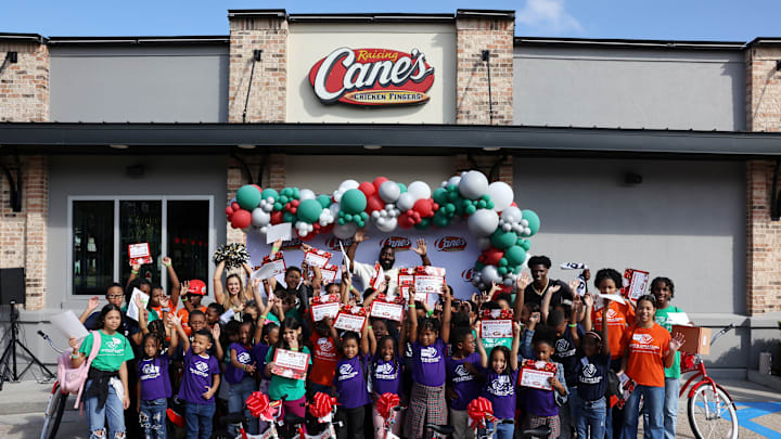 Demario Davis teams up with Raising Cane's for bike donation. Demario Davis teams up with Raising Cane's for bike donation.