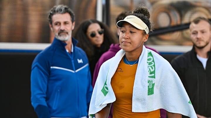 Naomi Osaka and Patrick Mouratoglou after a practice session.