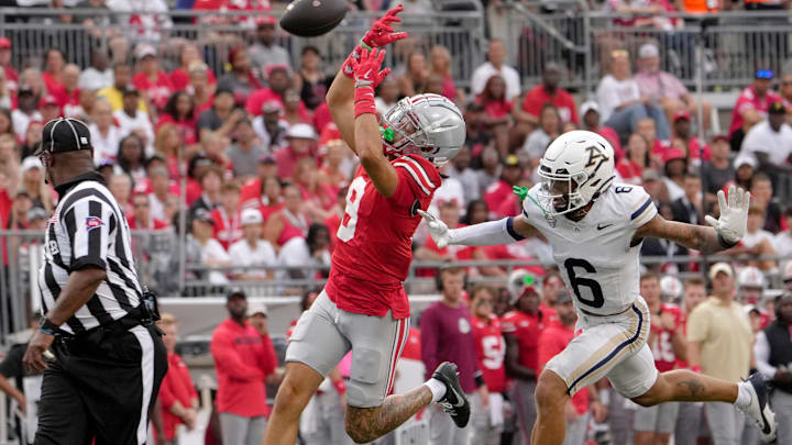 August 31, 2024; Columbus, Ohio, USA;
Ohio State Buckeyes wide receiver Jayden Ballard (9) can’t reel in a pass while defended by Akron Zips cornerback Joey Hunter (6) during the second half of Saturday’s NCAA Division I football game at Ohio Stadium.
