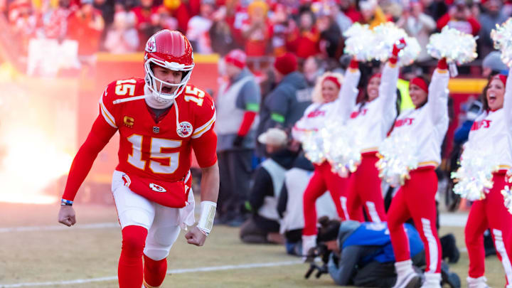 Jan 26, 2025; Kansas City, MO, USA; Kansas City Chiefs quarterback Patrick Mahomes (15) reacts as he runs onto the field prior to the game against the Buffalo Bills in the AFC Championship game at GEHA Field at Arrowhead Stadium. Mandatory Credit: Mark J. Rebilas-Imagn Images