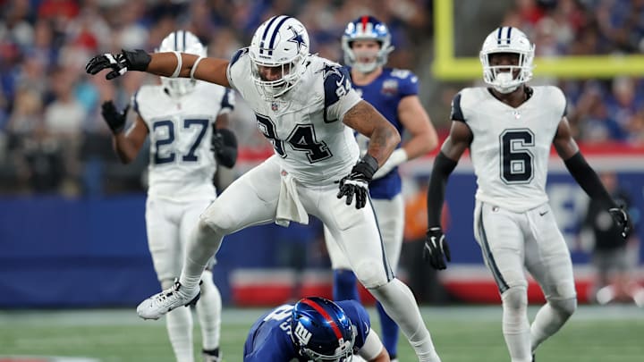 Dallas Cowboys defensive end Marshawn Kneeland reacts after tackling New York Giants quarterback Daniel Jones