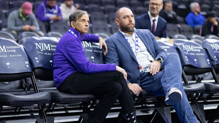 Dec 13, 2022; Philadelphia, Pennsylvania, USA; Sacramento Kings owner Vivek Ranadive (L) and general manager Monte McNair (R) look on during warm ups before a game against the Philadelphia 76ers at Wells Fargo Center. Mandatory Credit: Bill Streicher-Imagn Images