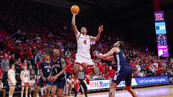 Dec 10, 2024; Piscataway, New Jersey, USA; Rutgers Scarlet Knights guard Ace Bailey (4) goes to the basket asPenn State Nittany Lions guard Freddie Dilione V (4) and guard Ace Baldwin Jr. (1) defend during the second half at Jersey Mike's Arena. Mandatory Credit: Vincent Carchietta-Imagn Images Dec 10, 2024; Piscataway, New Jersey, USA; Rutgers Scarlet Knights guard Ace Bailey (4) goes to the basket asPenn State Nittany Lions guard Freddie Dilione V (4) and guard Ace Baldwin Jr. (1) defend during the second half at Jersey Mike's Arena. Mandatory Credit: Vincent Carchietta-Imagn Images