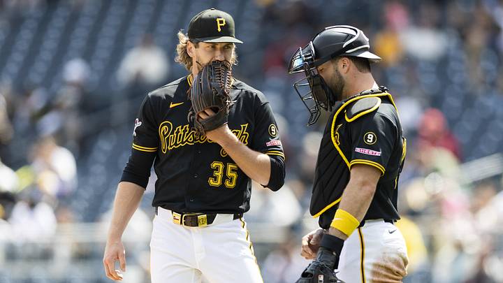 May 3, 2026; Pittsburgh, Pennsylvania, USA;  Pittsburgh Pirates starting pitcher Braxton Ashcraft (35) talks with catcher Joey Bart (14) during the seventh inning at PNC Park. Mandatory Credit: Scott Galvin-Imagn Images