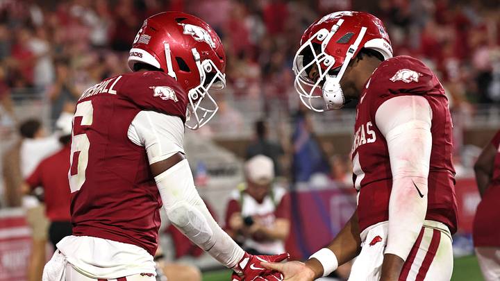 Sep 26, 2026; Fayetteville, Arkansas, USA; Arkansas Razorbacks wide receiver Chris Marshall (6) celebrates with quarterback KJ Jackson (7) after scoring a touchdown during the third quarter against the Tulsa Golden Hurricanes at Donald W. Reynolds Razorback Stadium. Mandatory Credit: Nelson Chenault-Imagn Images Sep 26, 2026; Fayetteville, Arkansas, USA; Arkansas Razorbacks wide receiver Chris Marshall (6) celebrates with quarterback KJ Jackson (7) after scoring a touchdown during the third quarter against the Tulsa Golden Hurricanes at Donald W. Reynolds Razorback Stadium. Mandatory Credit: Nelson Chenault-Imagn Images